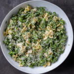 Serving bowl with Kale Pasta Caesar Salad.