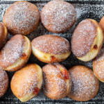 Krapfens on a tray.
