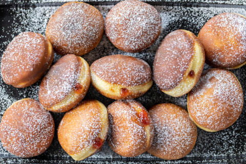 Krapfens on a tray.