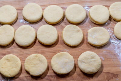 Cut out donuts on a board.