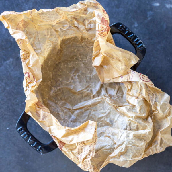 Lined baking pan with parchment paper.