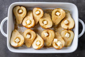 Pears in a pan with sugar and butter.