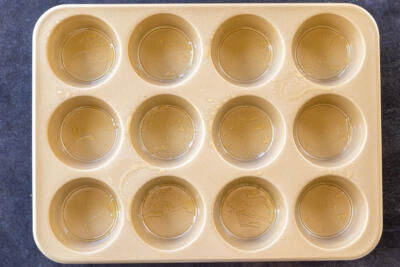 Buttered muffin pan.