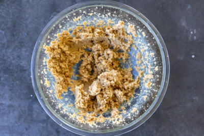 Butter and sugars combined in a bowl.