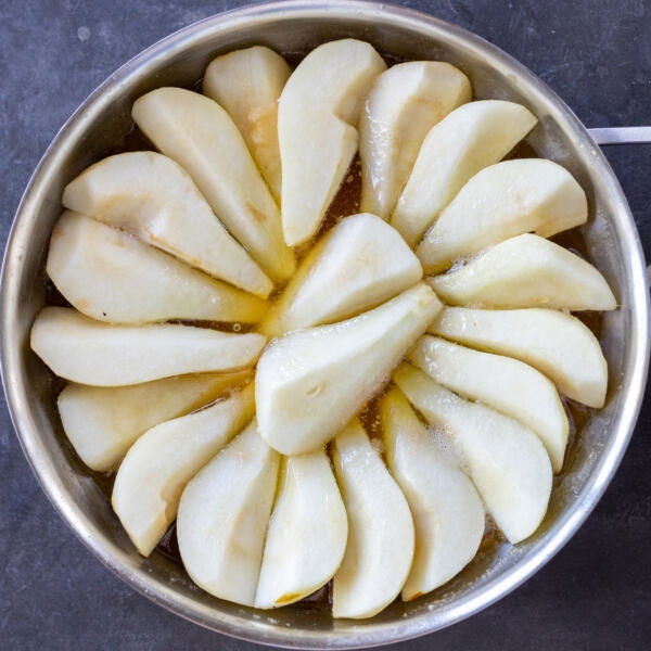 Pears cooking in a pan.