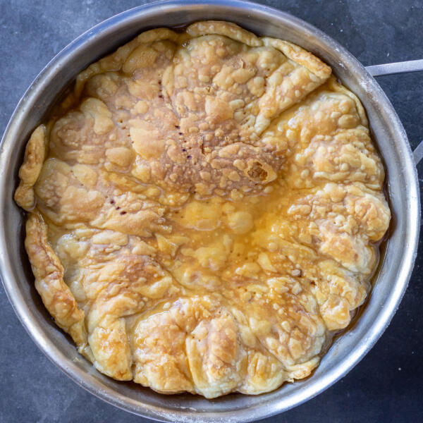Pear Tarte Tatin baked in a pan.