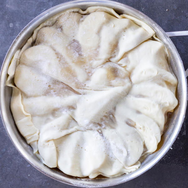 Puff pastry on top of pears.