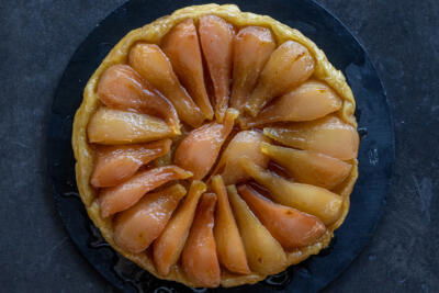 Baked Pear Tarte Tatin on a plate.