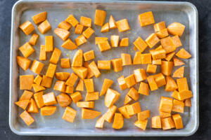 Sweet Potatoes on a baking sheet.
