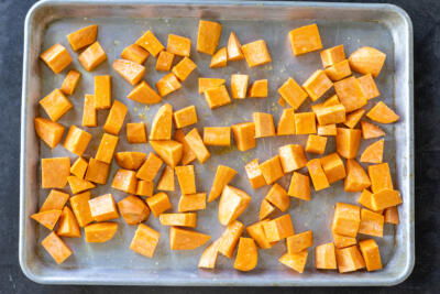 Sweet Potatoes on a baking sheet.