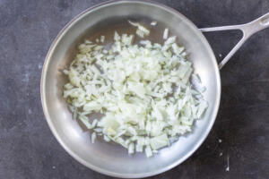 Onion cooking in a pan.