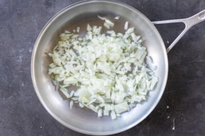 Onion cooking in a pan.
