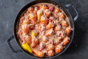Stuffed Mini Peppers with sauce before cooking.