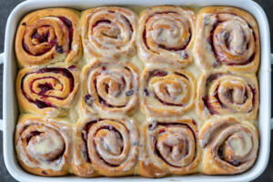 Baked Cranberry Cinnamon Rolls with Orange Glaze.