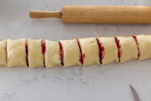 Sliced up rolls in a counter.