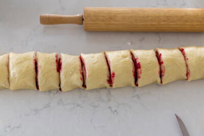 Sliced up rolls in a counter.