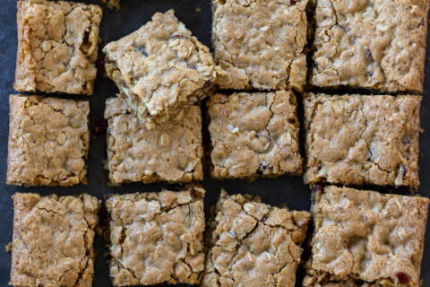 Oatmeal Cranberry Bars with Walnuts sliced up.