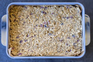 Oatmeal Cranberry Bars with Walnuts ingredients in a baking dish.