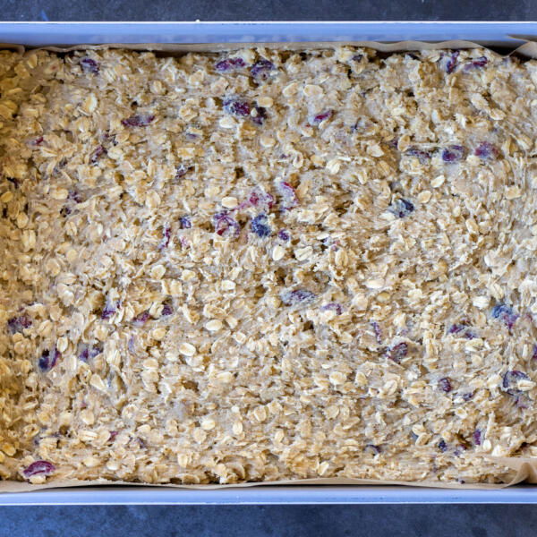 Oatmeal Cranberry Bars with Walnuts ingredients in a baking dish.