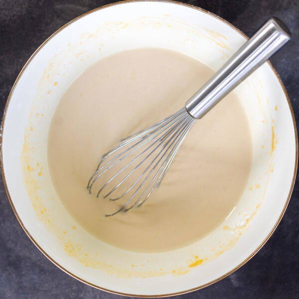 Crepe batter in a bowl.