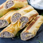 Blinchiki with Meat with serving tray.