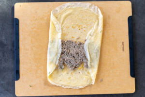 Crepe with meat filling and edges folded over.
