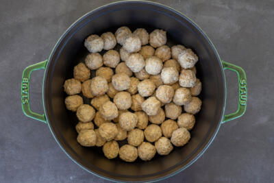 A pot with meatballs.