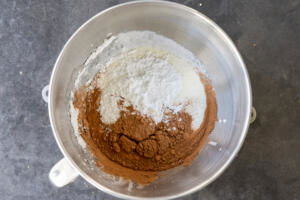 Whipping creamw ith sugar and cacao powder.