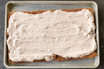 Cake cream added to the baked sponge cake.