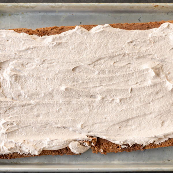 Cake cream added to the baked sponge cake.