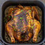 Air Fryer Whole Chicken in a basket.