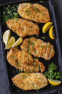 Serving tray with Baked Chicken Cutlets.