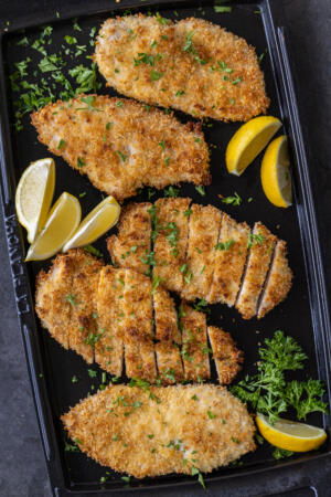 Serving tray with Baked Chicken Cutlets.