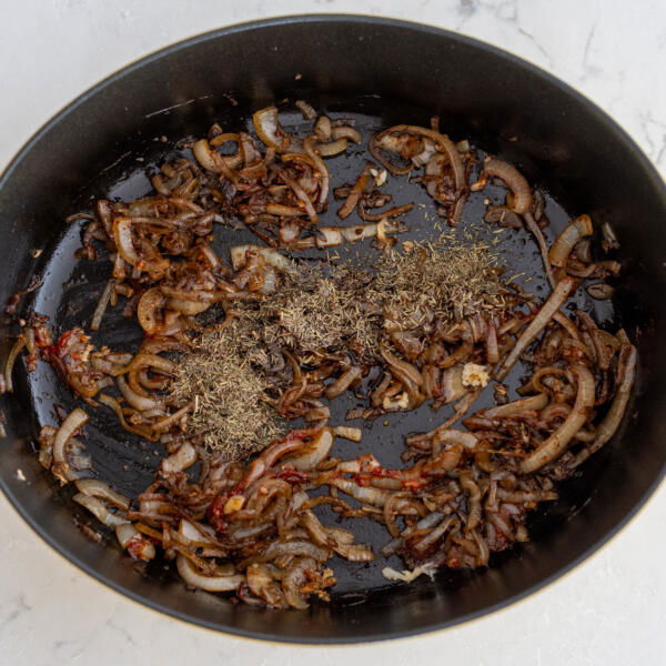 Thyme and Worcestershire sauce added to the onions.