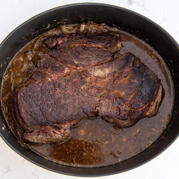 Broth and beef add to the pot.