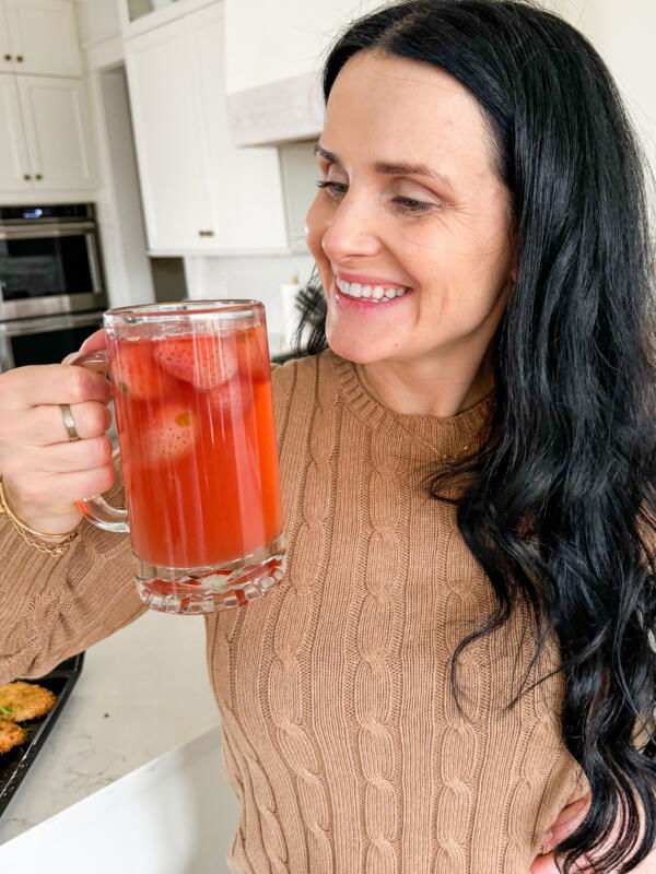 Natalya has Kissel drink in hand.