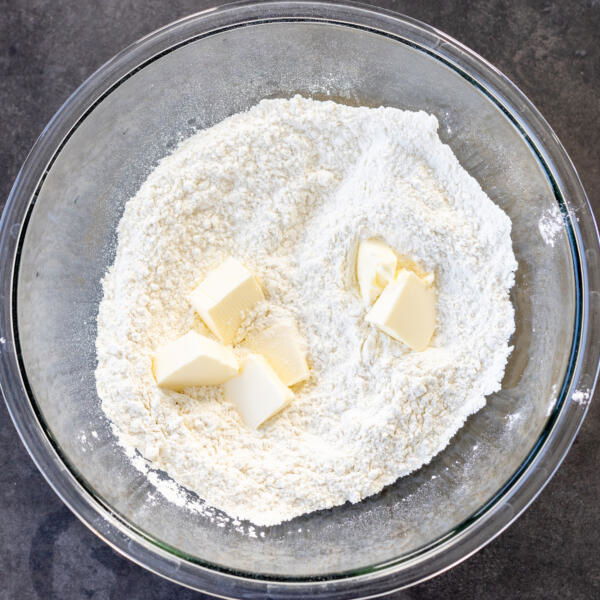 Flour, salt and butter in a bowl.