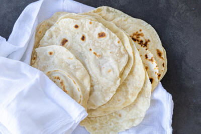 Towel with Sourdough Flour Tortillas.