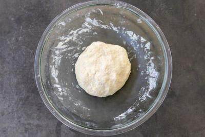 Kneaded dough in a bowl.