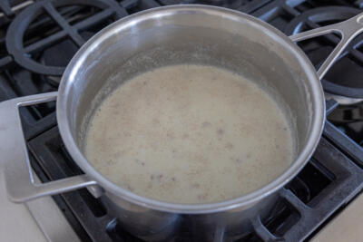 Pot with oats and milk.