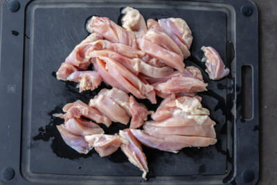 Chicken sliced into pieces.