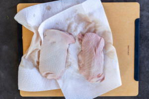 Duck breast on a paper towel.