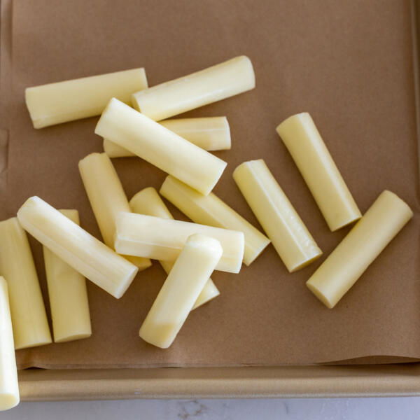 Cheese stick cut into pieces.