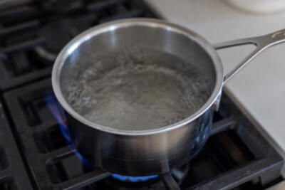 Water boiling in a pot.
