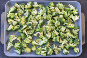Broccoli on a baking sheet.