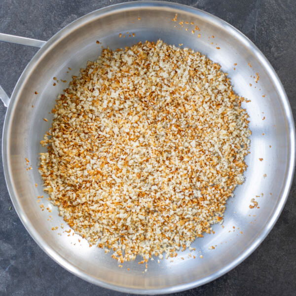 Bread crumbs on a pan.