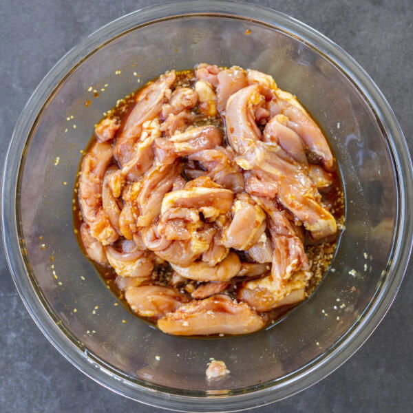 Chicken and teriyaki in a bowl.