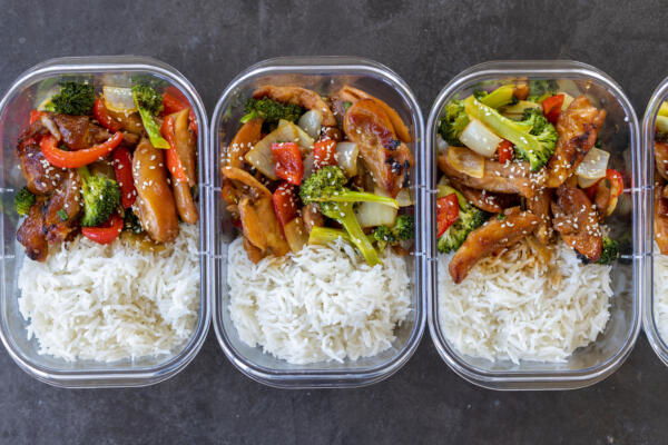 Chicken teriyaki and rice on a prep box.