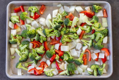 Veggies with oil on a sheetpan.