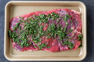 Flank on a sheet pan with Chimichurri.
